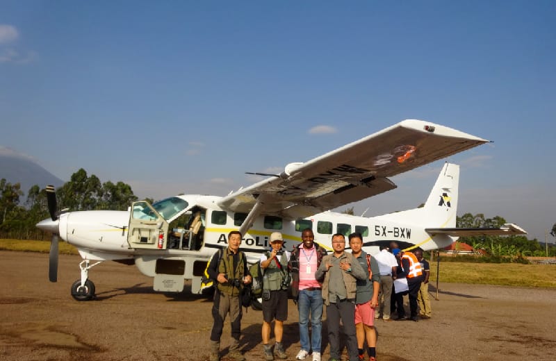  our clients getting ready for their flight at Kisoro airstrip Uganda 